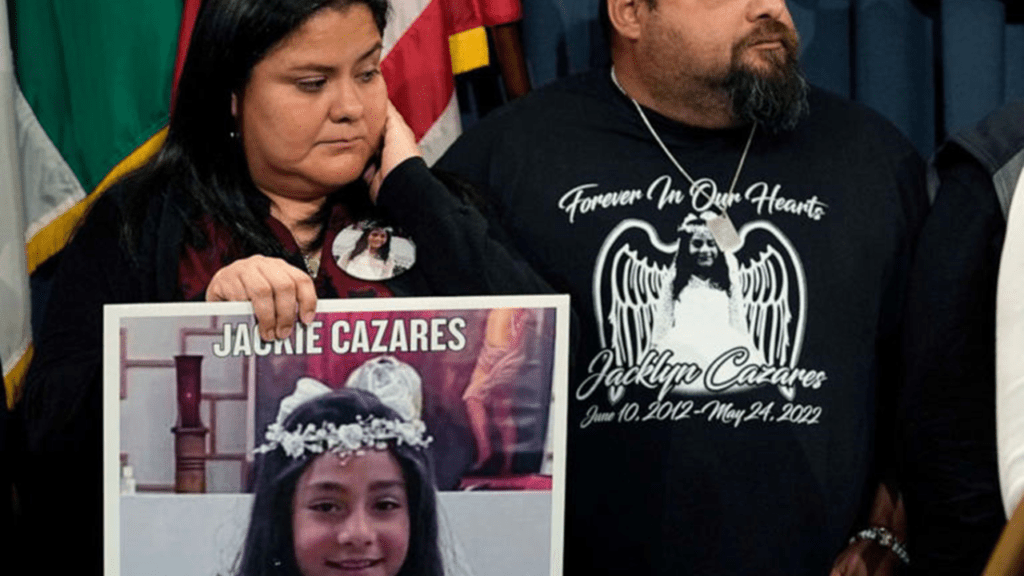 Gloria and Javier Cazares hold a picture of their daughter Jackie, who was one of 19 children killed by a gunman at Robb Elementary School in Uvalde, Texas, on January 24, 2023, during a news conference at the Texas Capitol in Austin,