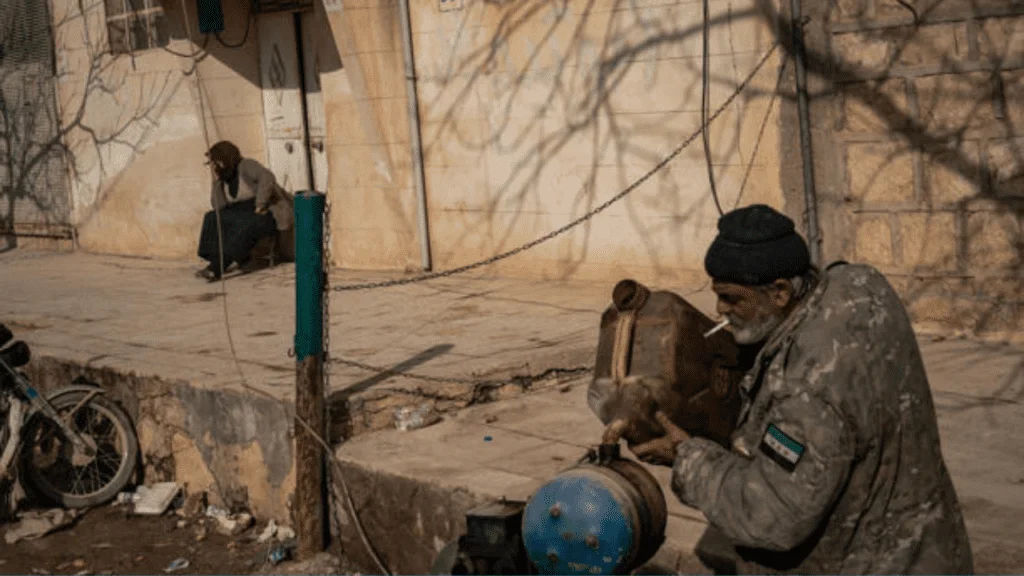 JINDIRES, SYRIA - FEBRUARY 10: A man fills a generator with gasoline near the town of Jindires, Syria, Friday, February 10, 2023. It is estimated that 850 people were found dead and hundreds are believed dead still under the rubbles after a 7.8-magnitude earthquake that hit the region. (Photo by Salwan Georges/The Washington Post) © Salwan Georges/The Washington Post