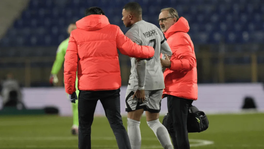 Injured Kylian Mbappe is carried off the field during the French League One soccer match between Montpellier and Paris Saint-Germain at the State La Mosson stadium in Montpellier, France, Wednesday, Feb. 1, 2023.