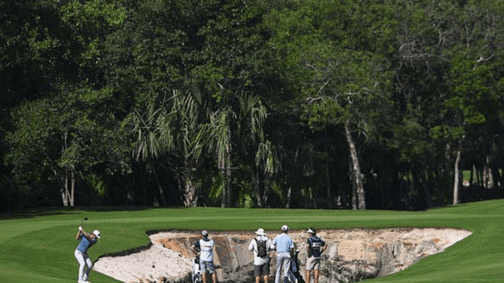 On the seventh hole of the Mayakoba Resort course, there is a well-known cave bunker. © Provided by Daily Mail