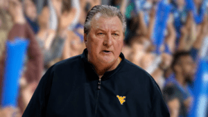 After being arrested for DUI, West Virginia men's basketball coach Bob Huggins quits and says he will retire.