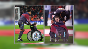 England star Bellingham gives his tracksuit top to a wheelchair-bound mascot. It's a touching moment.