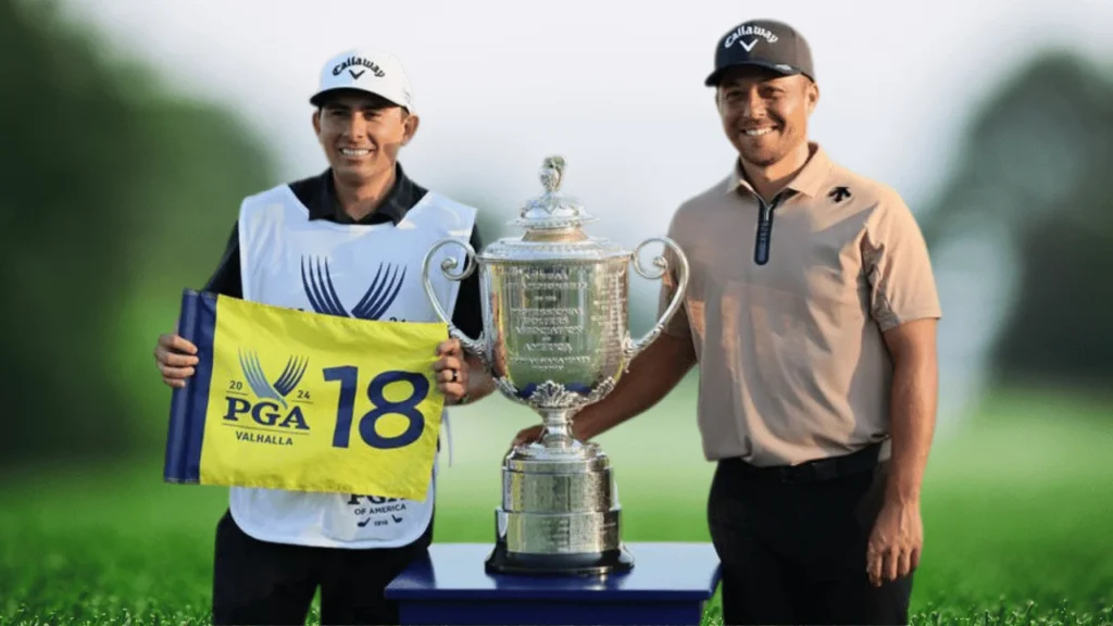 After winning the 2024 PGA Championship, Xander Schauffele of the United States and Austin Kaiser, his caddie, pose with the Wanamaker Trophy.
