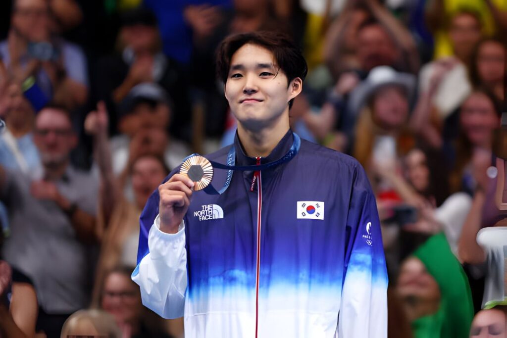 Olympiads at the Paris 2024 Summer Olympics: Day 1: Bronze Medalist Woomin Kim of Team Republic of Korea poses with his medal during the Medal Ceremony after the Men's 400m Freestyle Final on July 27, 2024, at the Paris La Defense Arena in Nanterre, France. (By Maddie Meyer/Getty Images)