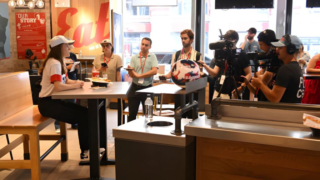 Tierna Davidson (L) celebrates her Olympic Homecoming at Raising Cane's Astor Place in New York City on August 15, 2024. For Raising Cane's, Noam Galai/Getty Images.