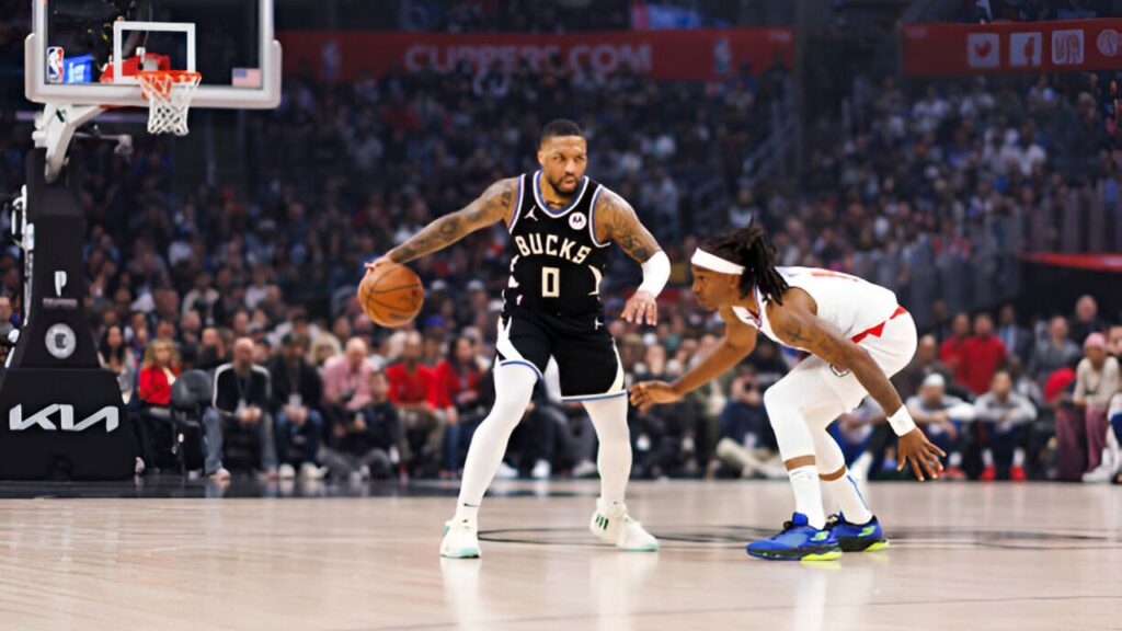 Milwaukee Bucks guard Damian Lillard dribbling during a game against the LA Clippers at Crypto.com Arena in Los Angeles.