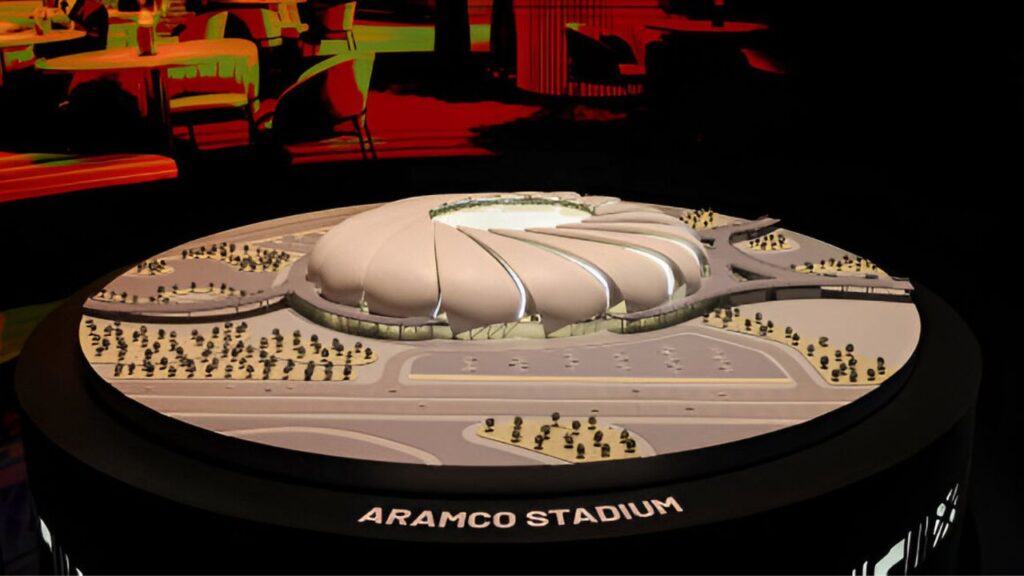 Aramco's branding at a football stadium during a major match.