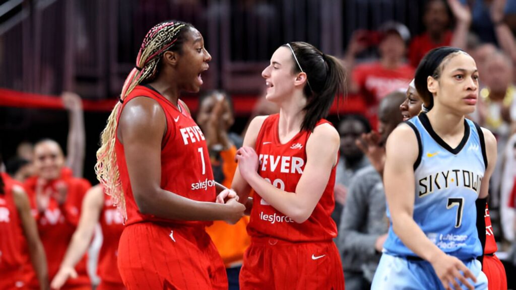 Aliyah Boston and Caitlin Clark of the Indiana Fever celebrate after defeating the Chicago Sky at Gainbridge Fieldhouse.